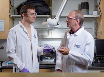 John Reynolds and Brian Schmatz in Reynolds' lab